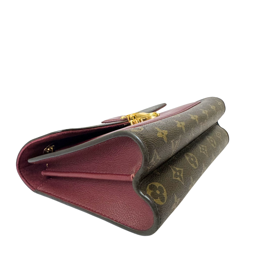 Louis Vuitton Victoire Bag in Raisin Monogram Canvas