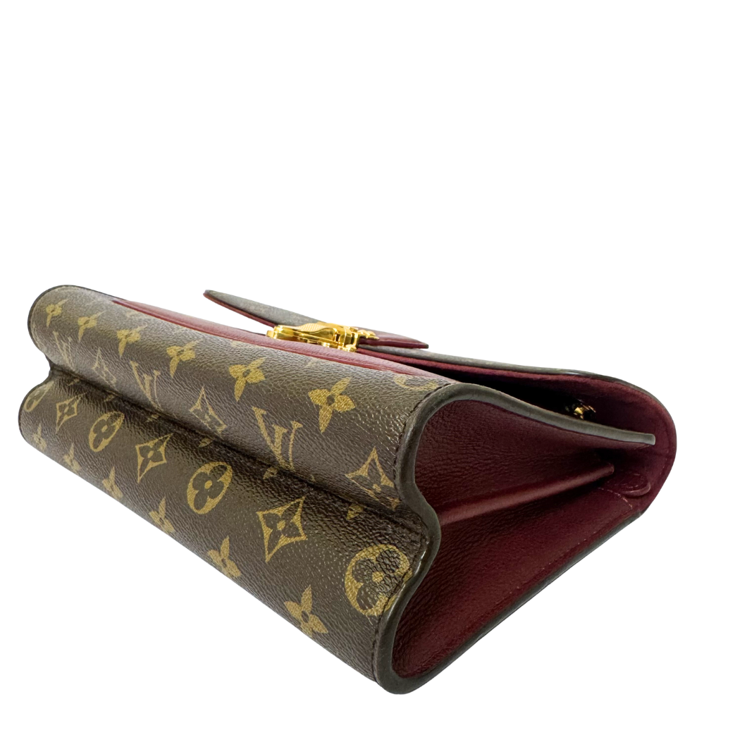 Louis Vuitton Victoire Bag in Raisin Monogram Canvas