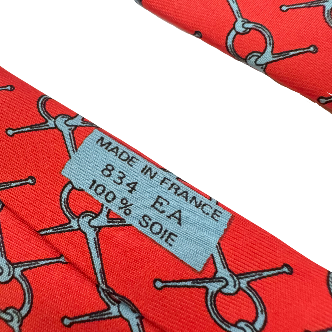 Hermès Silk Tie in Red Horsebit Print