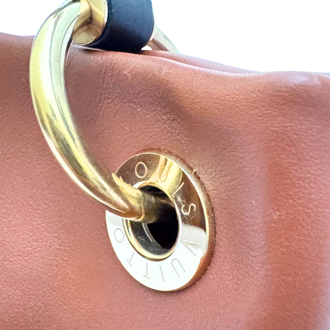 Louis Vuitton Tuileries Hobo Bag in Monogram Canvas and Caramel