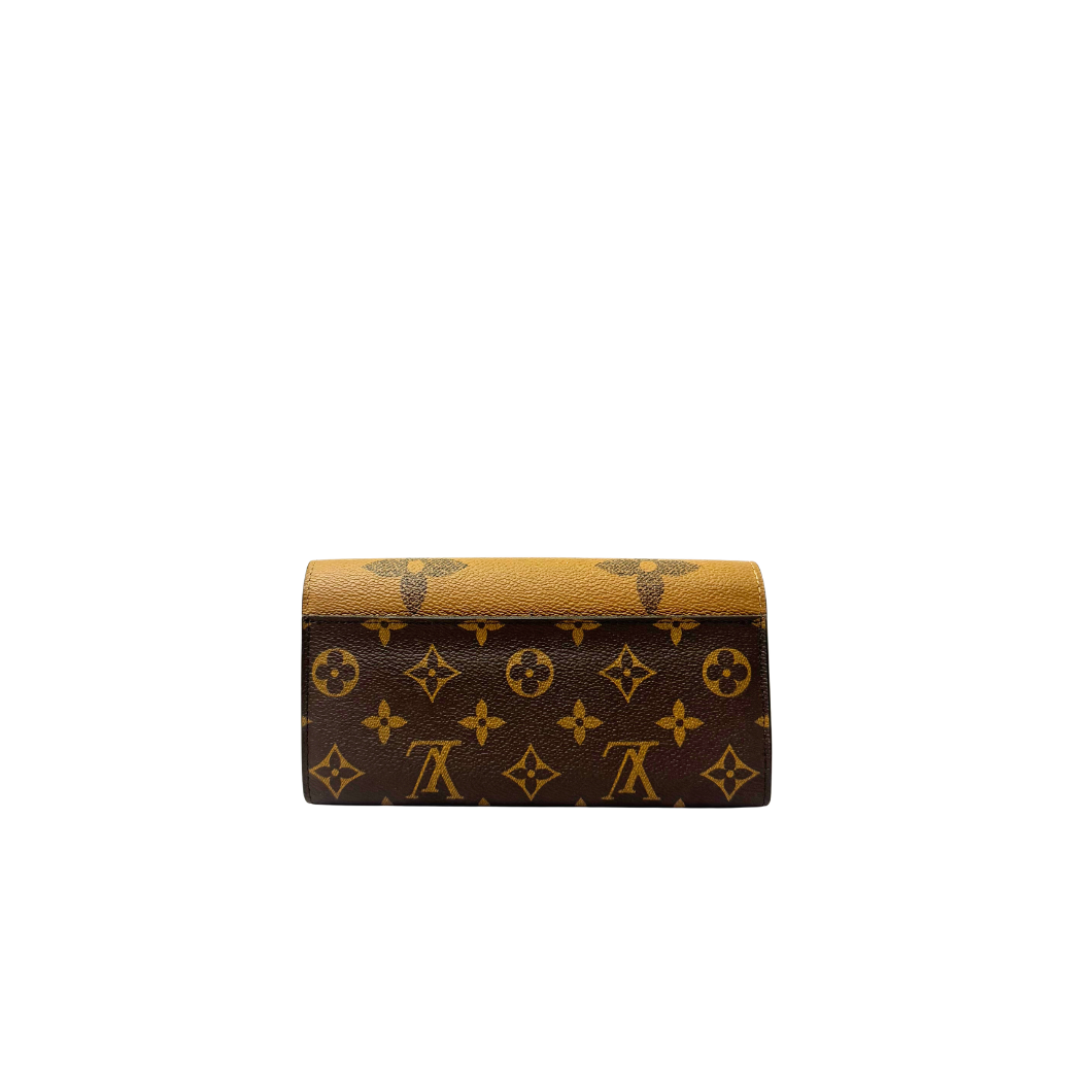 Louis Vuitton Sarah Wallet in Reverse Monogram