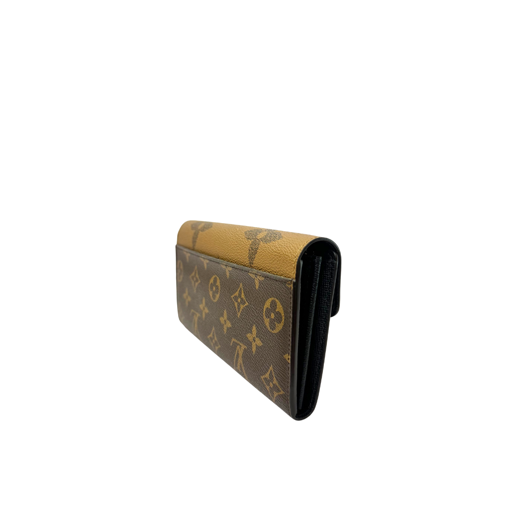 Louis Vuitton Sarah Wallet in Reverse Monogram