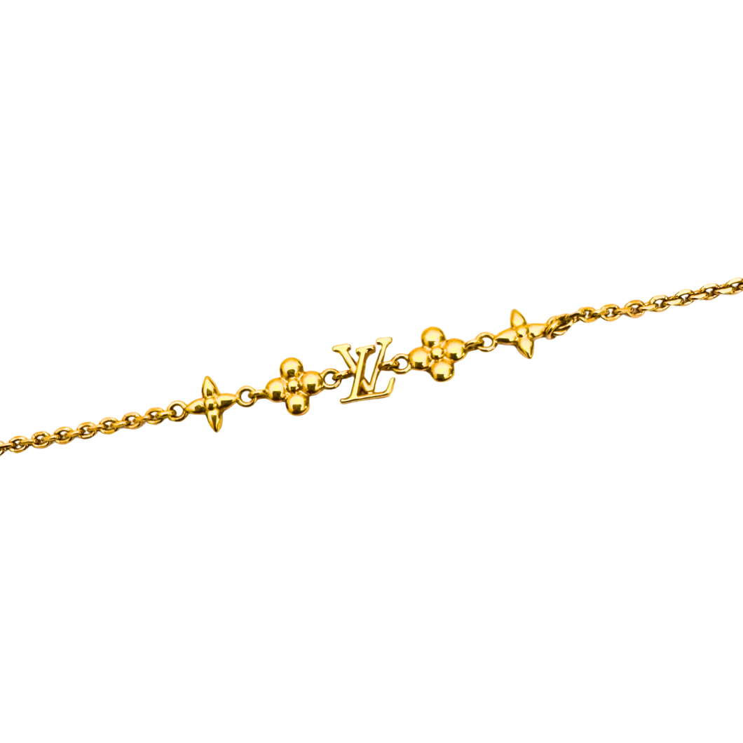 Louis Vuitton Fleur and Initials Bracelet in Gold-Tone