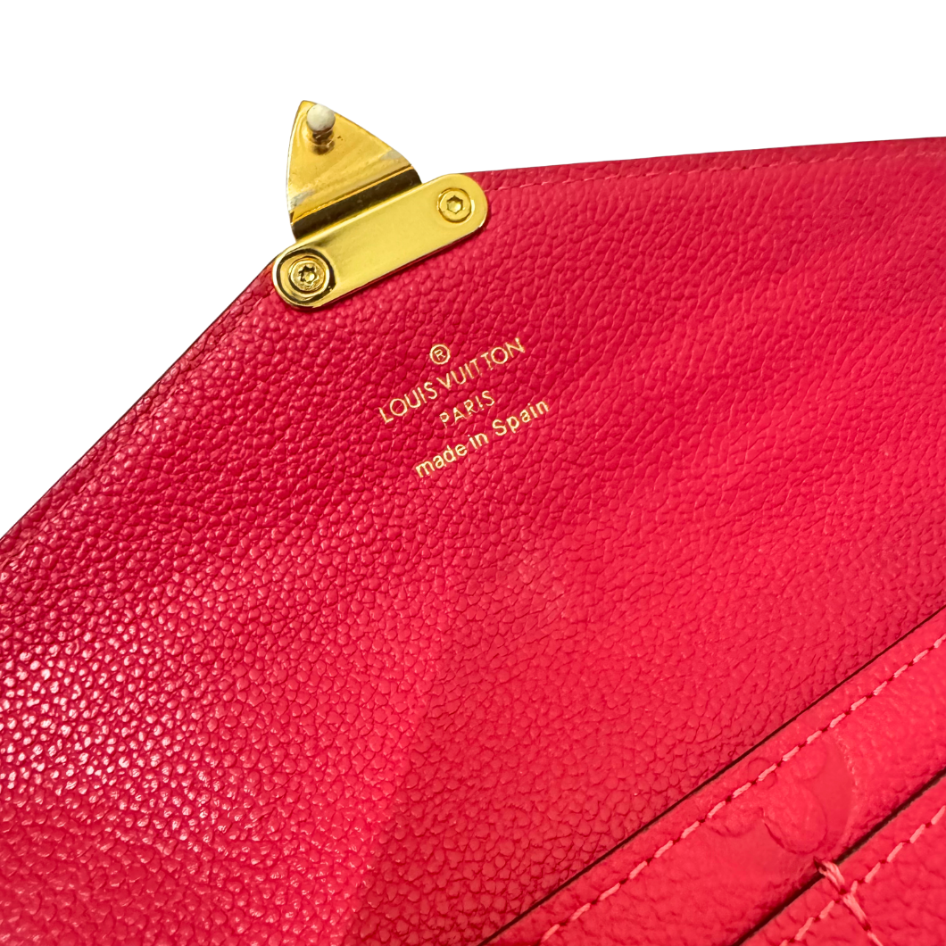 Louis Vuitton Métis Wallet in Fuchsia Monogram Empreinte