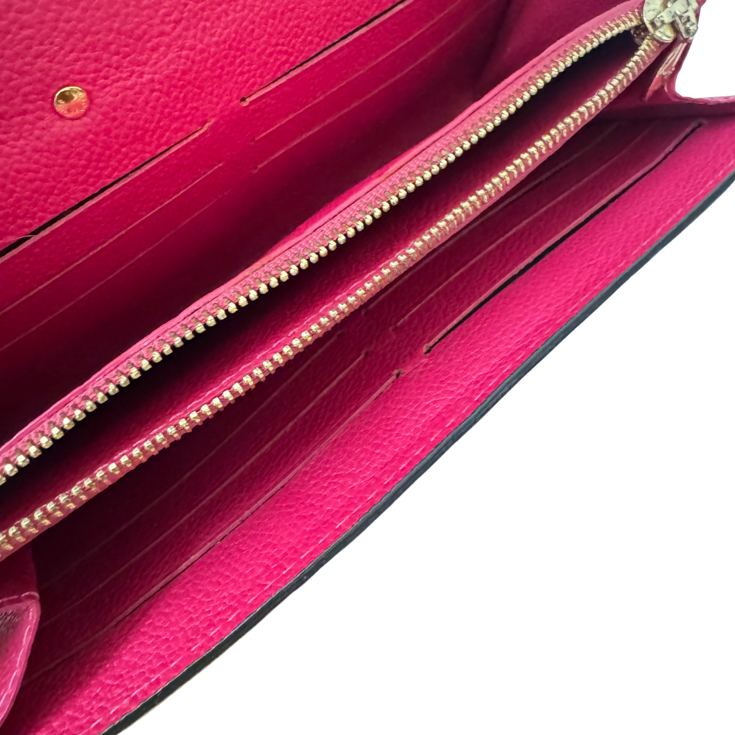 Louis Vuitton Métis Wallet in Fuchsia Monogram Empreinte