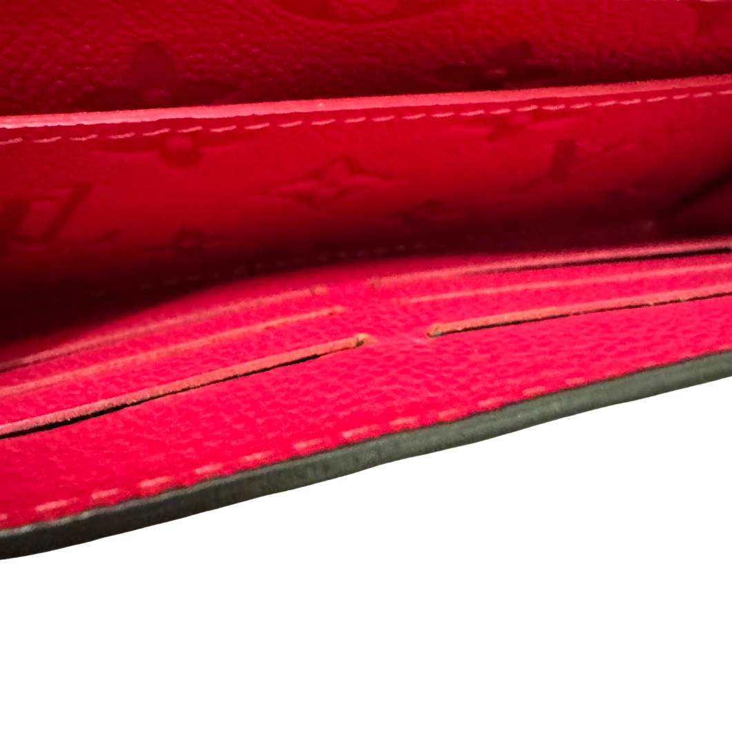 Louis Vuitton Métis Wallet in Fuchsia Monogram Empreinte