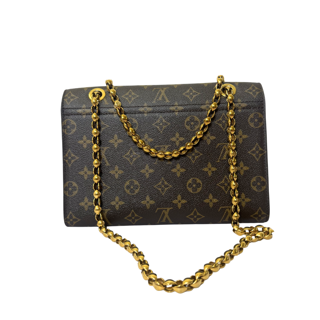 Louis Vuitton Victoire Bag in Raisin Monogram Canvas