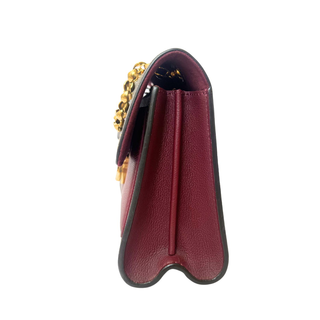Louis Vuitton Victoire Bag in Raisin Monogram Canvas