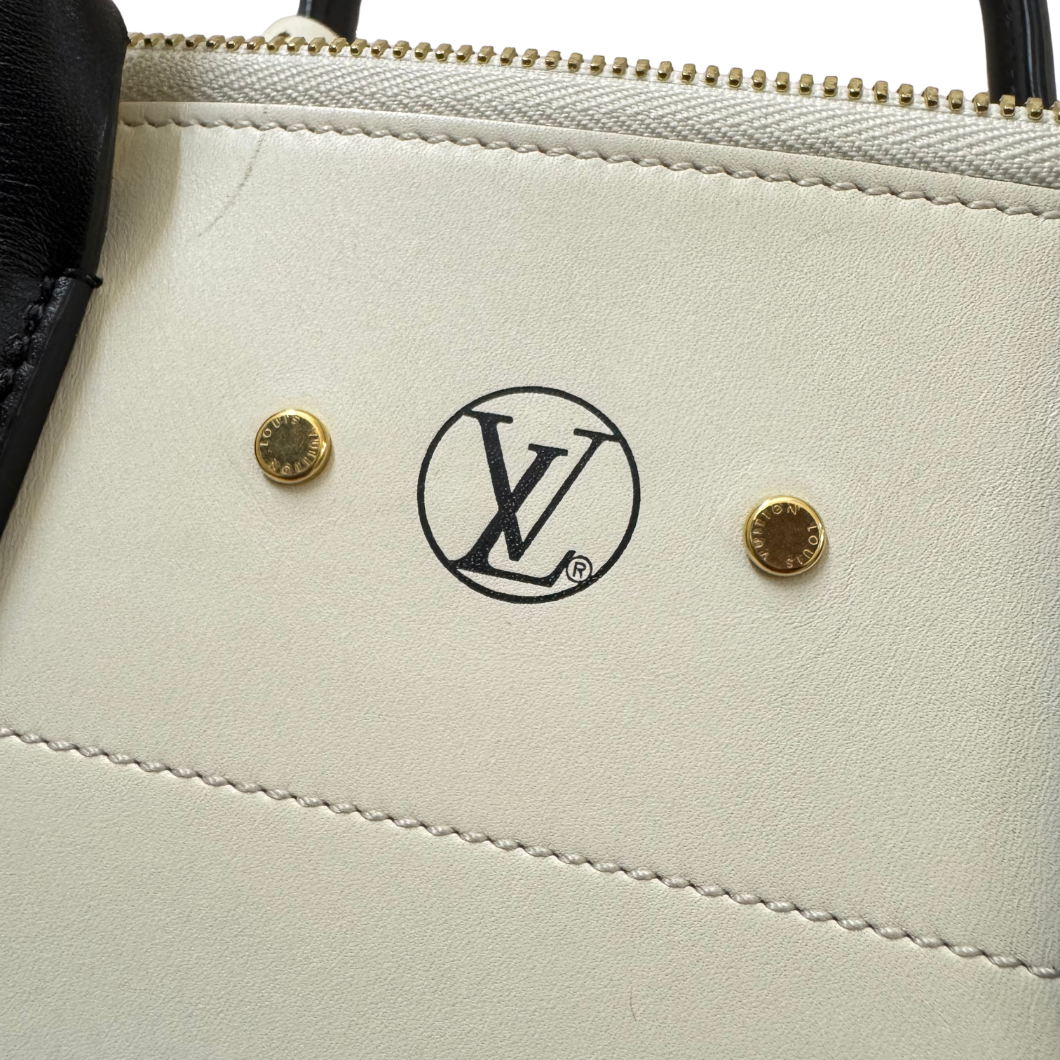 Louis Vuitton City Steamer in Tan & Cream