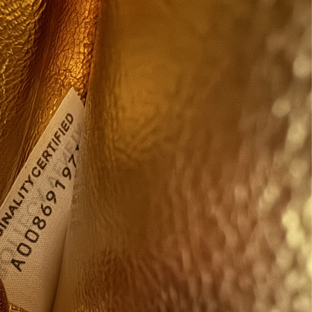 Bottega Veneta Andiamo Clutch in Metallic Gold Leather