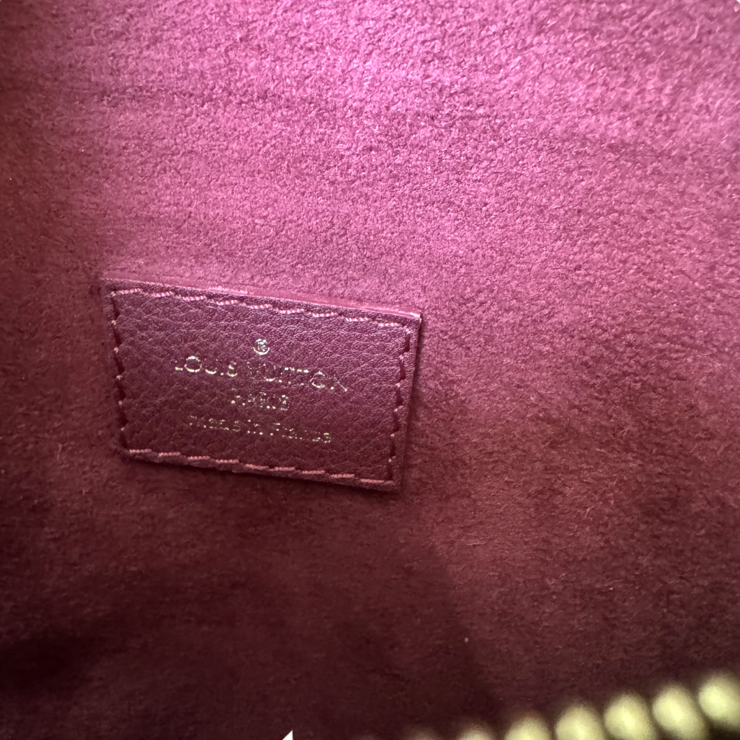 Louis Vuitton Victoire Bag in Raisin Monogram Canvas