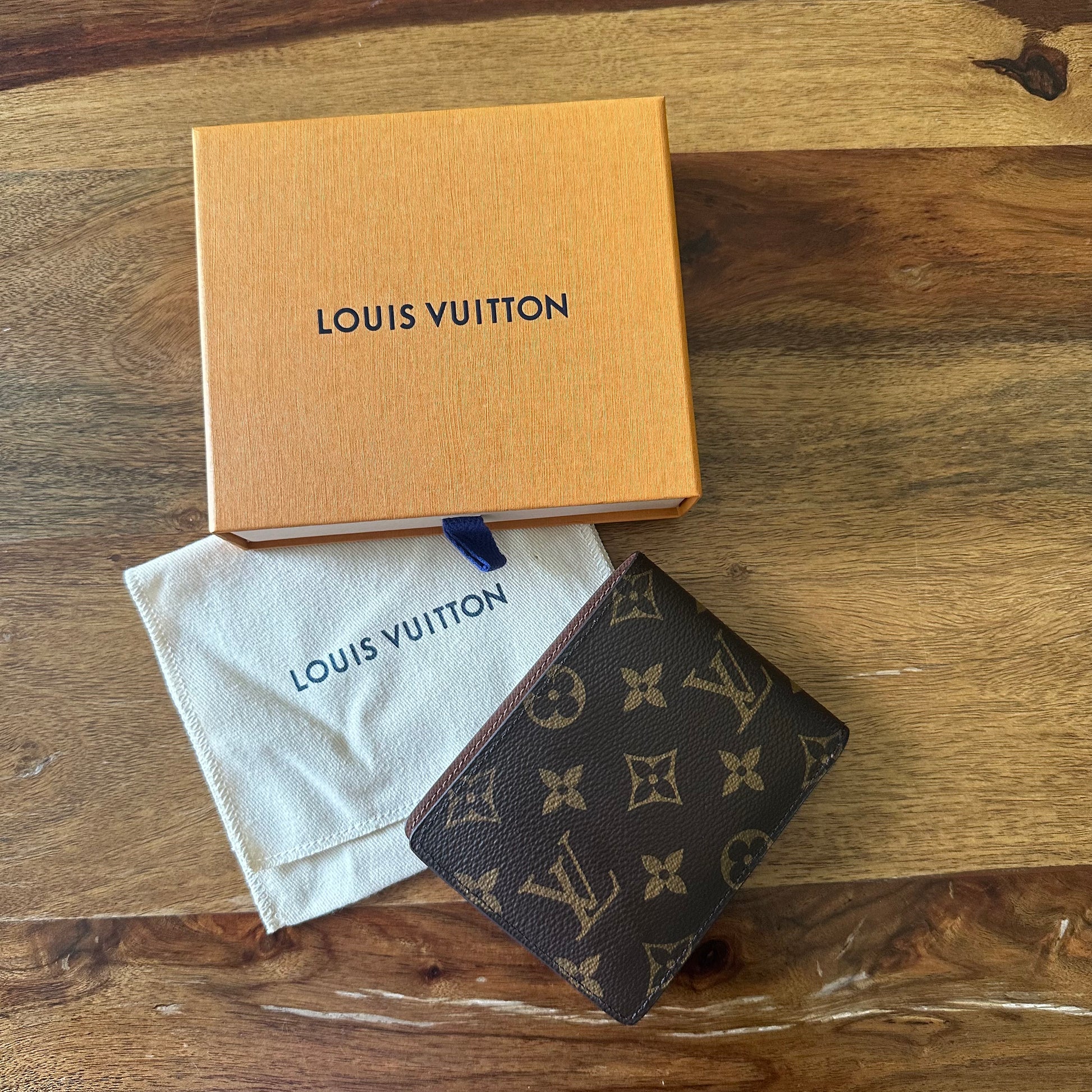Louis Vuitton Monogram Pattern Coated Canvas Multiple Wallet – Luxe Marché  India